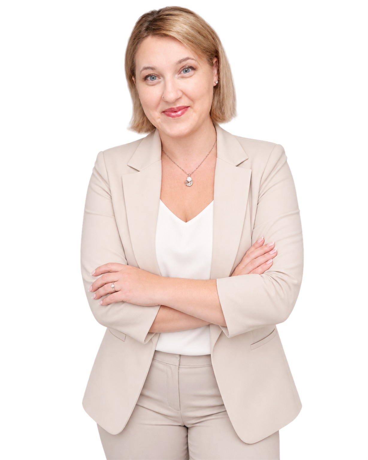Ralu Atomei, founder of Voleyra, wearing a cream suit with her arms crossed